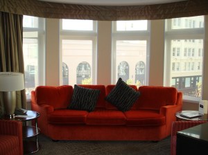 Sleper sofa with Virgin Store out the window