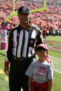 49ersRams100409-041 My son with the NFL ref sporting pink wristbands and ribbon